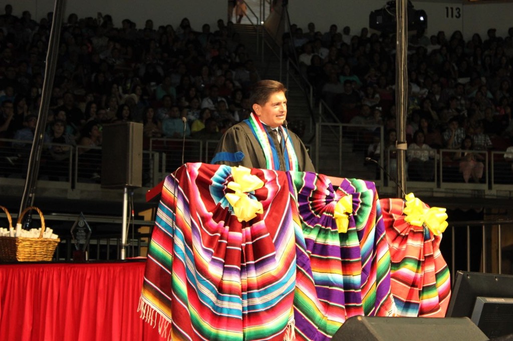 Tim Rios giving the keynote address at the Fresno State Latino Commencement ceremony