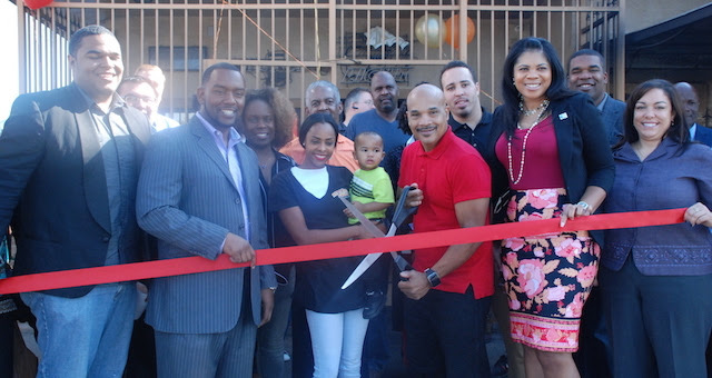 Group of people at a ribbon-cutting ceremony