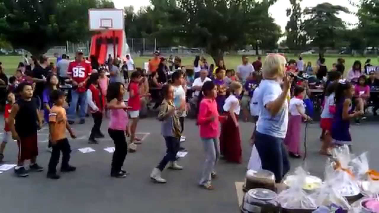 Elementary students participating in dance performance