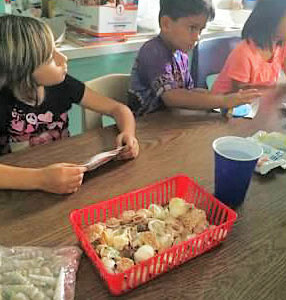 Students participating in art lesson